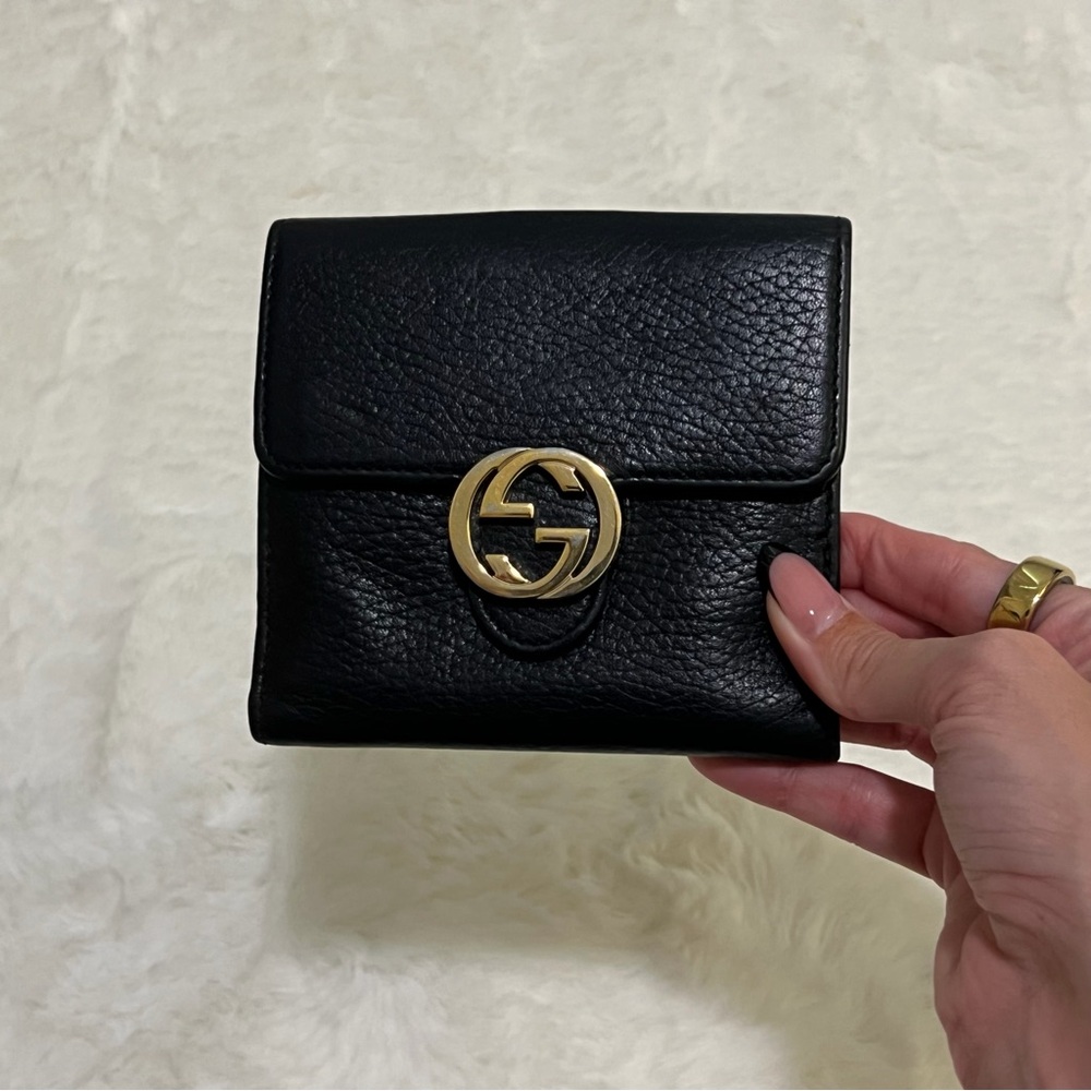 Gucci Black Wallet with Gold Emblem